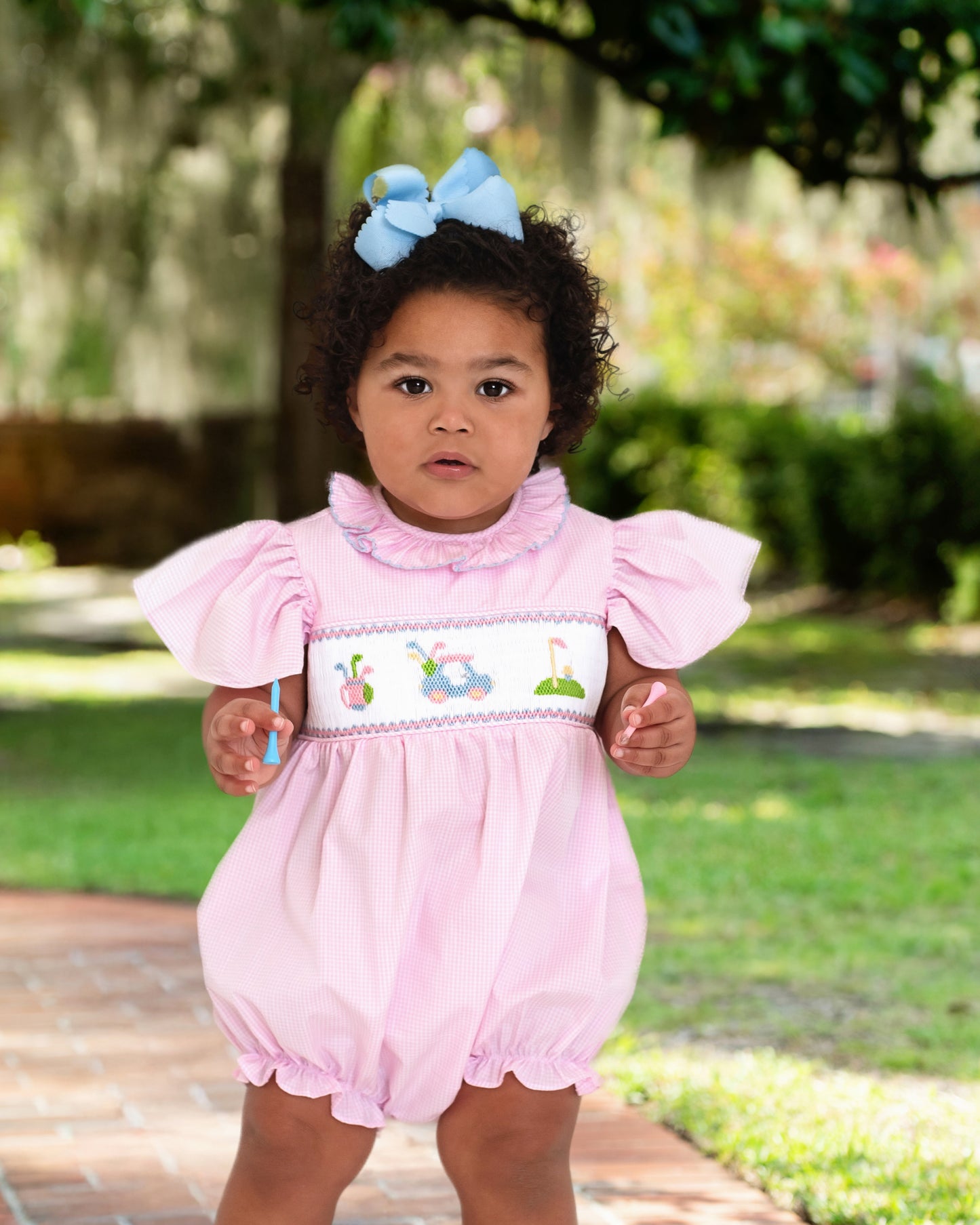 Pink Gingham Smocked Golf Bubble