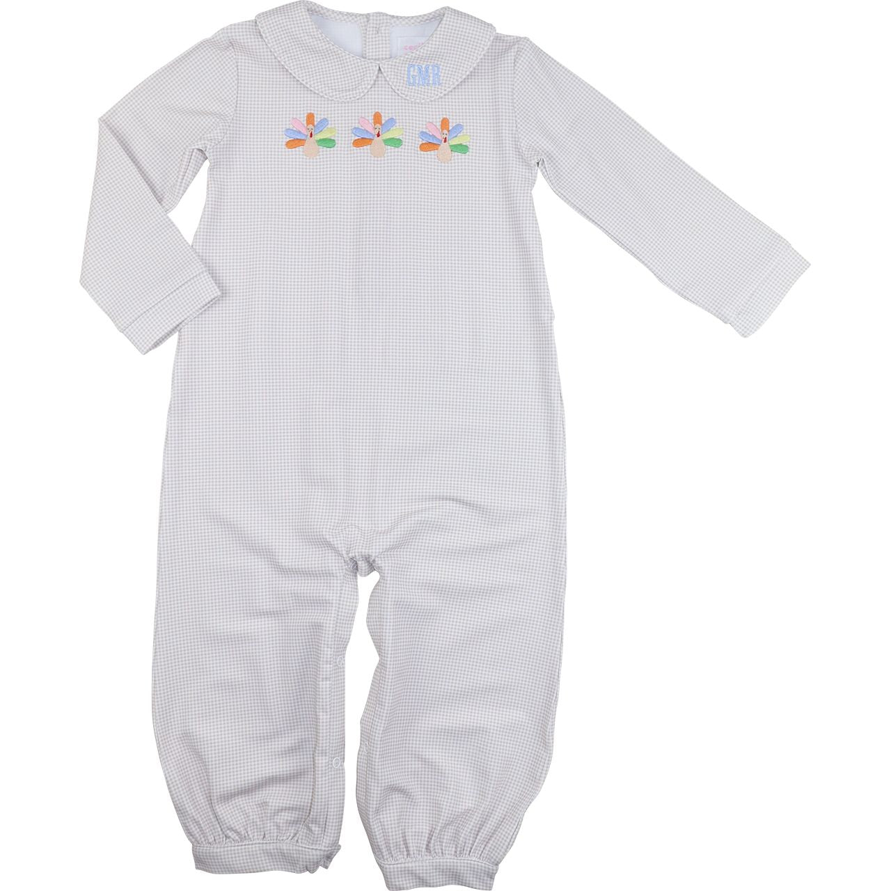 Khaki long romper with colorful turkey design on a white background