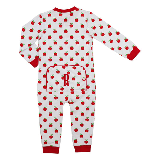 Children's onesie with red apple pattern on a white background
