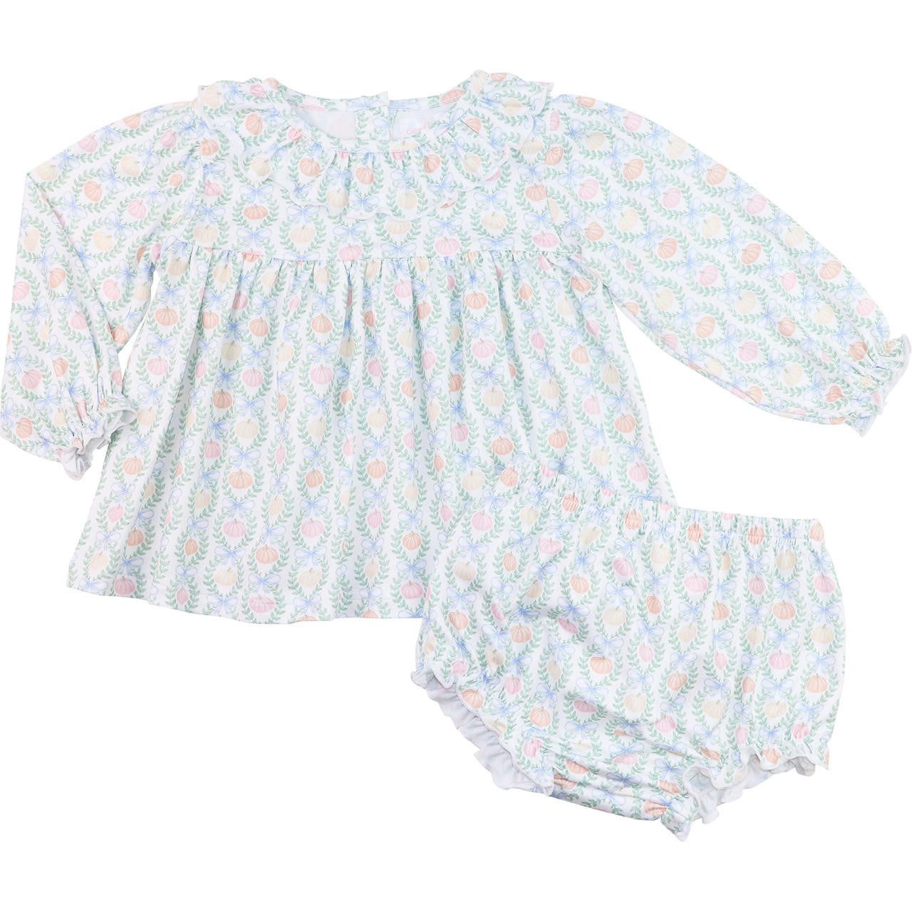 Baby outfit with floral and pumpkin  pattern on a white background