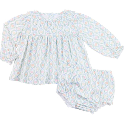 Baby outfit with floral and pumpkin  pattern on a white background