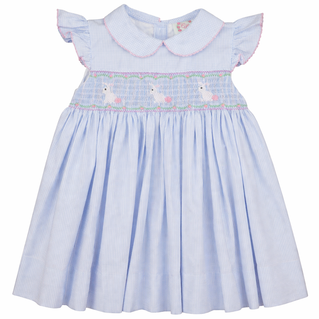 Light blue dress with bunny embroidery on a white background
