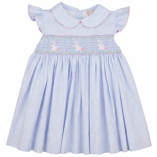 Light blue dress with bunny embroidery on a white background