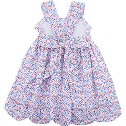 Floral dress with a pattern of cars and flowers on a white background
