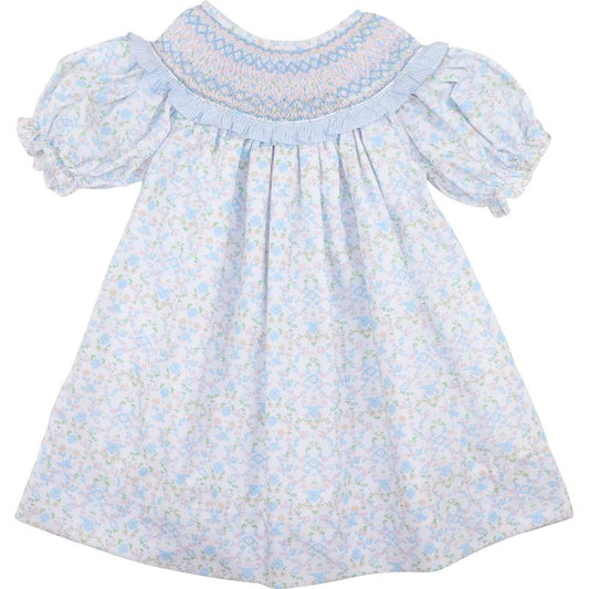 Baby dress with floral pattern on a white background