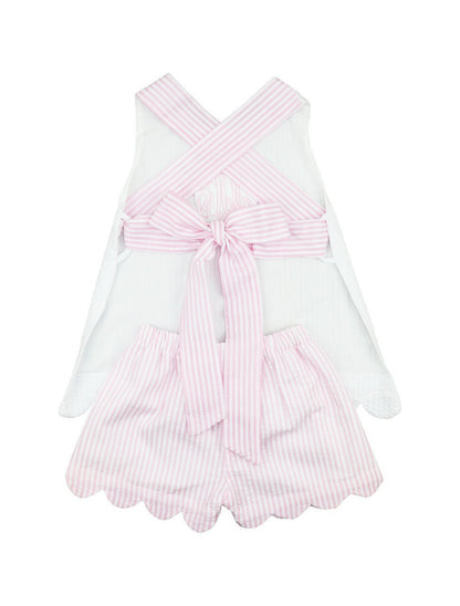 White short set with pink striped details on a white background