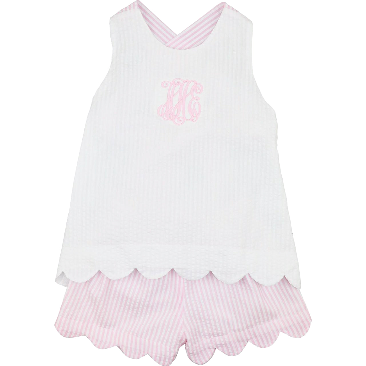 White sleeveless top with pink scalloped hem and matching shorts on a white background