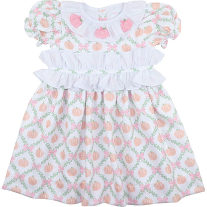 dress with pumpkin and flower pattern on a white background