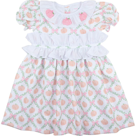 dress with pumpkin and flower pattern on a white background