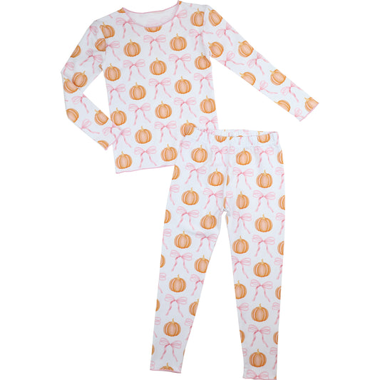 pajama set with pumpkin and bow pattern on a white background