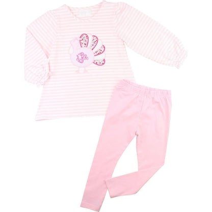 Pink legging set with a turkey on a white background