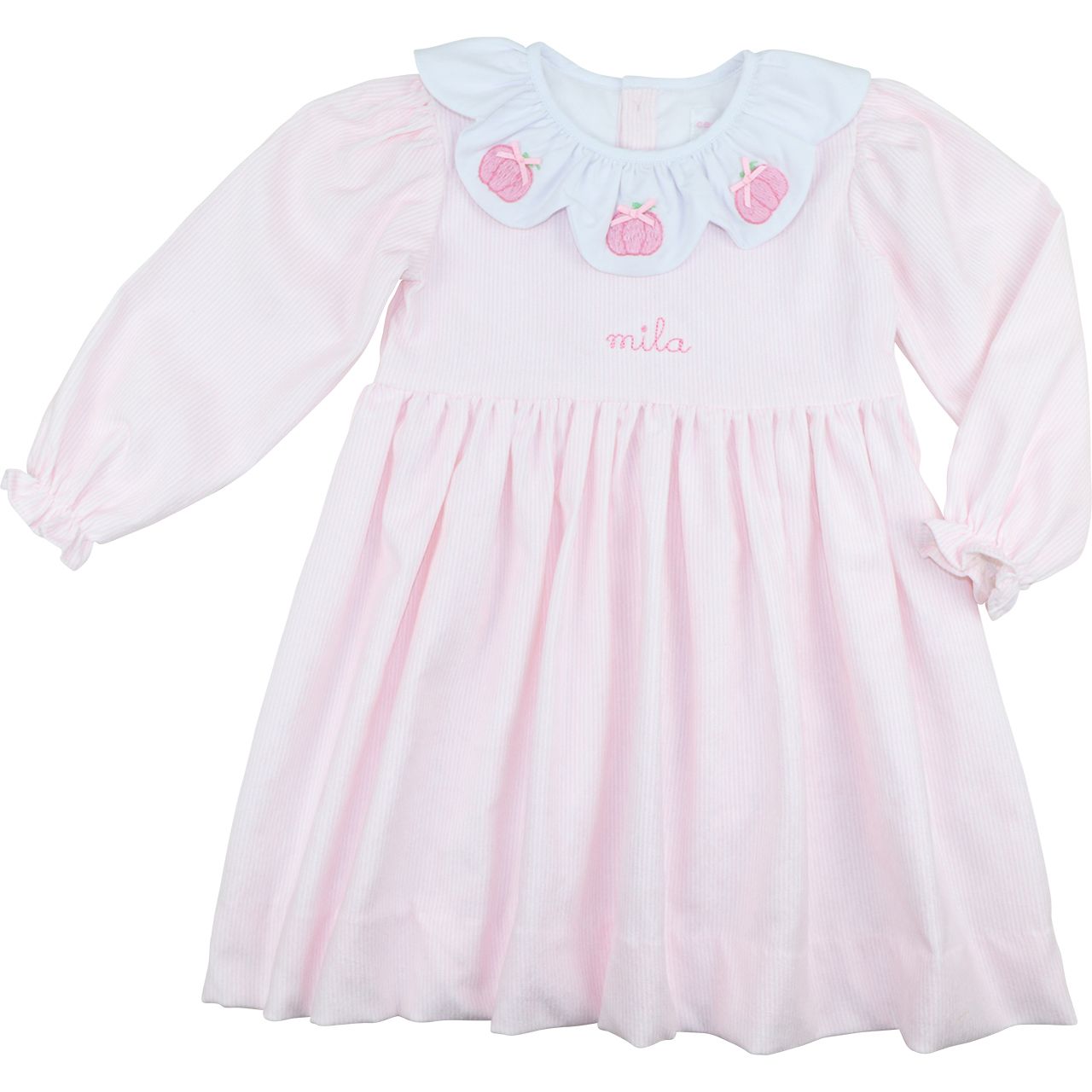 Pink dress with a white collar and pink pumpkins designs on a white background