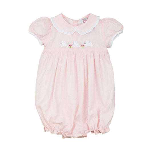 Pink swiss dot baby bubble with white collar and floral embroidery on a white background