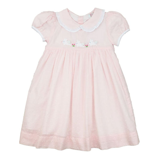 Pink swiss dot dress with white collar and embroidery on a white background