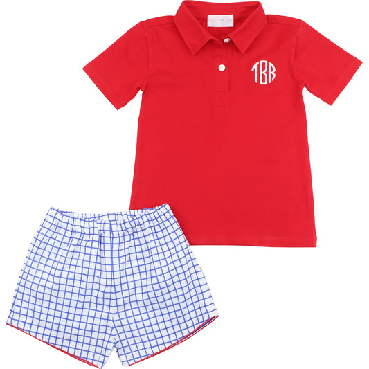 Red polo shirt with monogram and blue checkered shorts on a white background