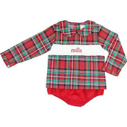 Red and green plaid baby outfit with 'mills' branding on a white background