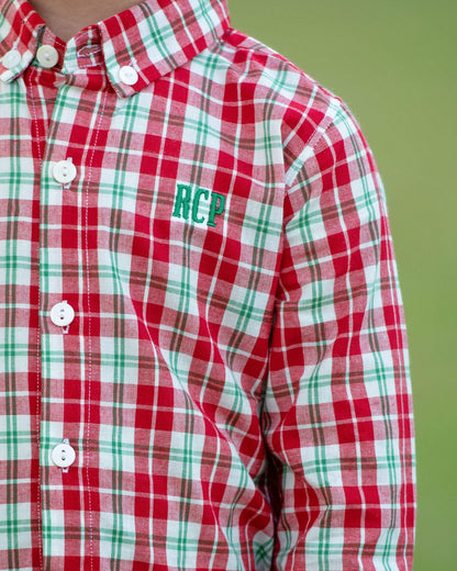 Red, green, and white plaid shirt with 'RCP' monogram on a green background