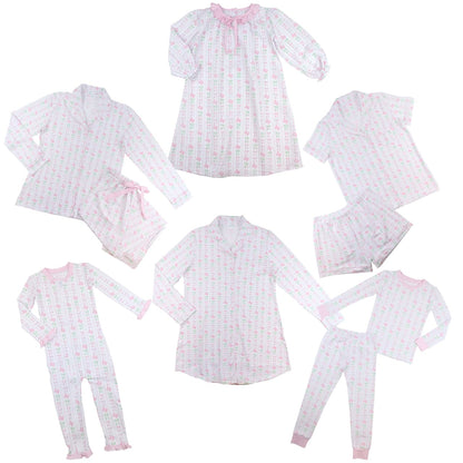 Set of pink and white checkered pajama sets on a white background
