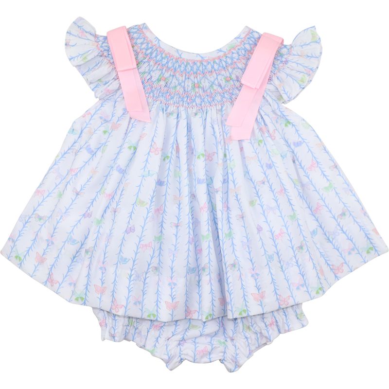 Baby dress with ruffled sleeves and pink straps on a white background