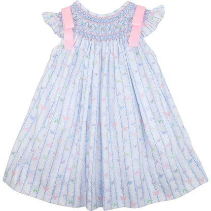 Children's dress with butterfly pattern on a white background
