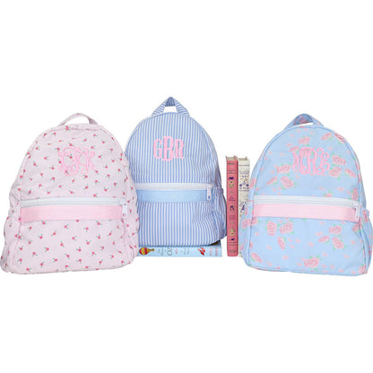 Three backpacks with monograms
