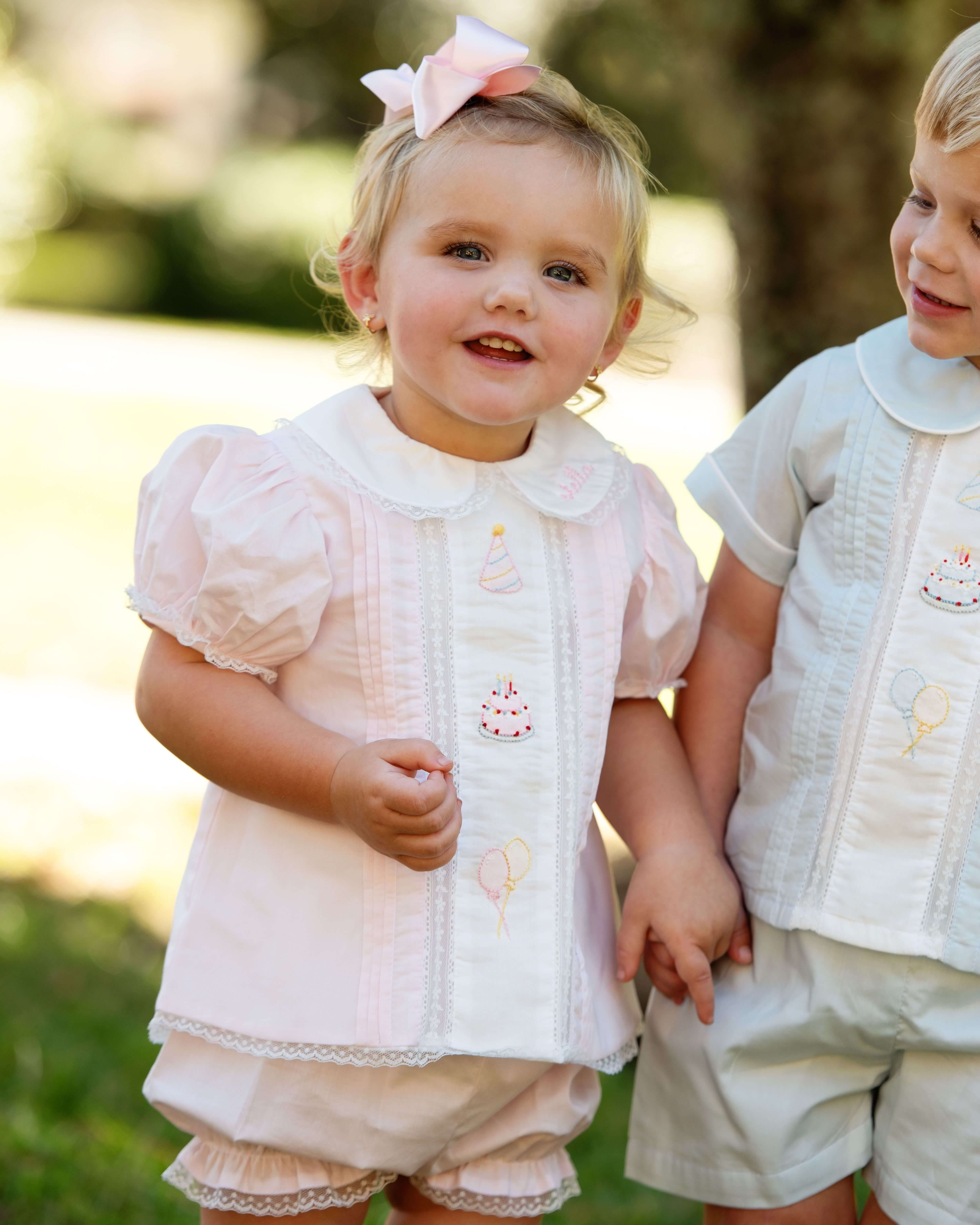 Two_children_in_matching_outfi