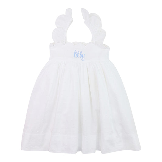 White dress with 'libby' embroidery on a white background