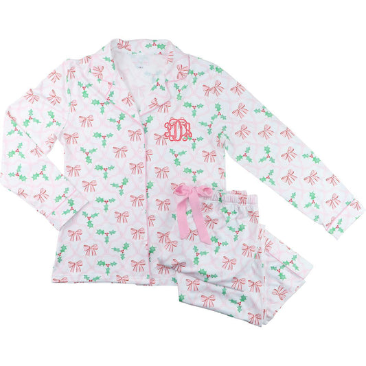 Women's pajama set with bow pattern on a white background