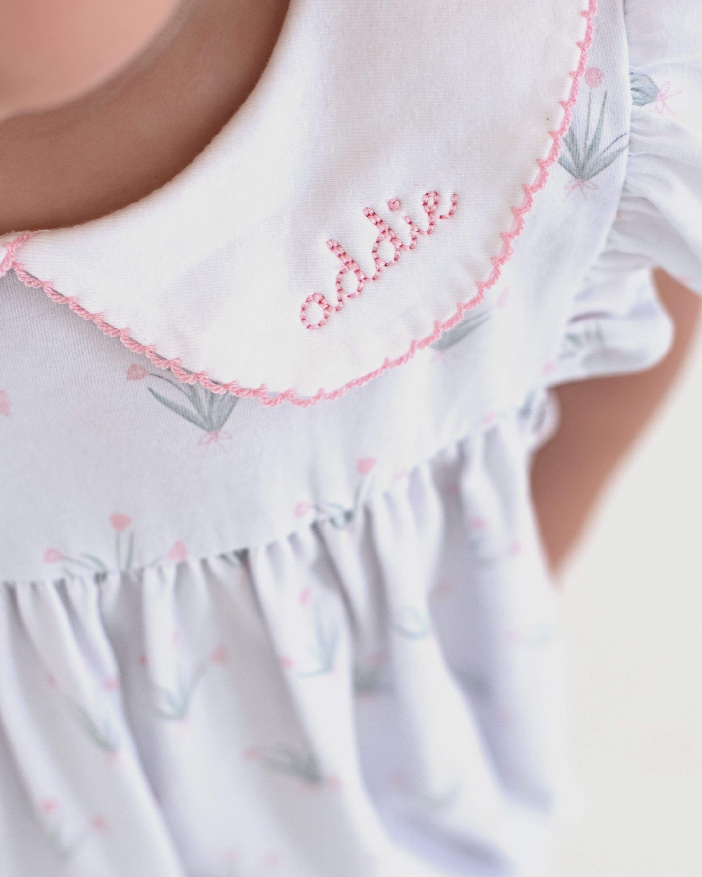 collar with pink trim and name addie on the collar