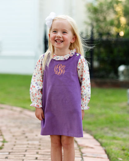 girl in purple floral dress monogram CBE