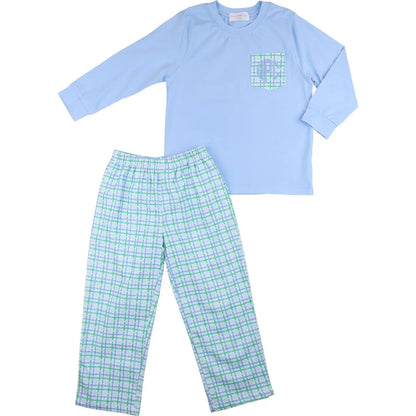 Light blue pajama top and green plaid pants on a white background