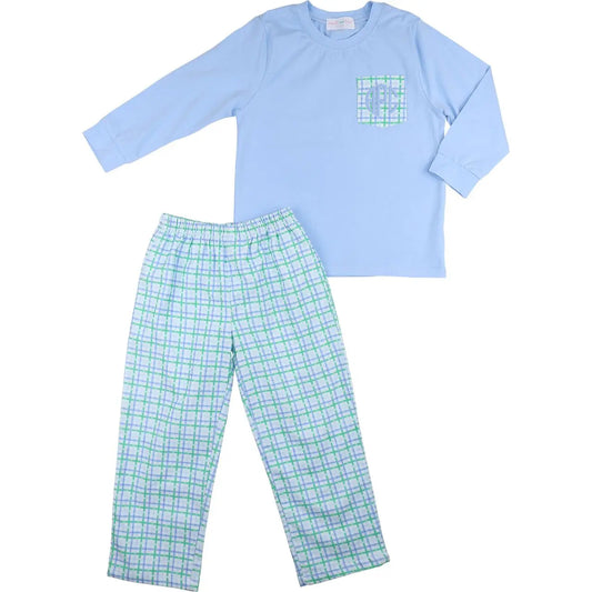 Light blue pajama top and green plaid pants on a white background