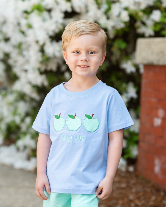 little boy wearing a back to school short set