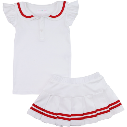 White top with red trim and white skirt with red stripes on a white background