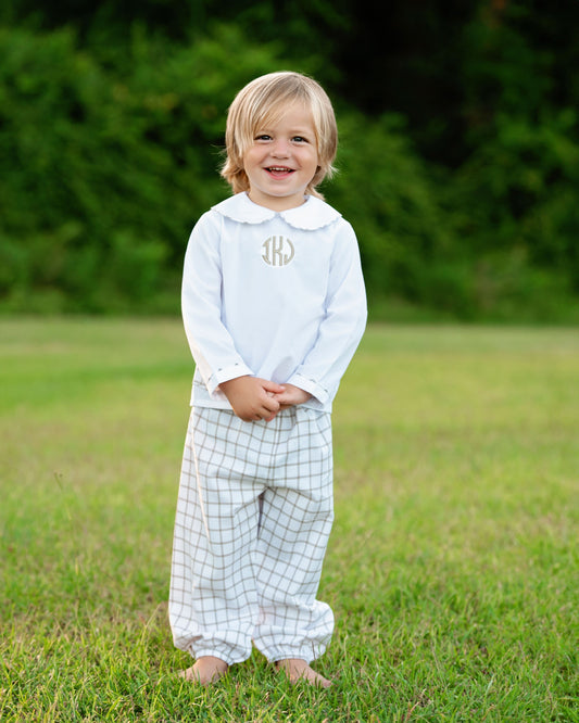 Boy wearing the Khaki Windowpane Ankle Pant Set with monogram outdoors